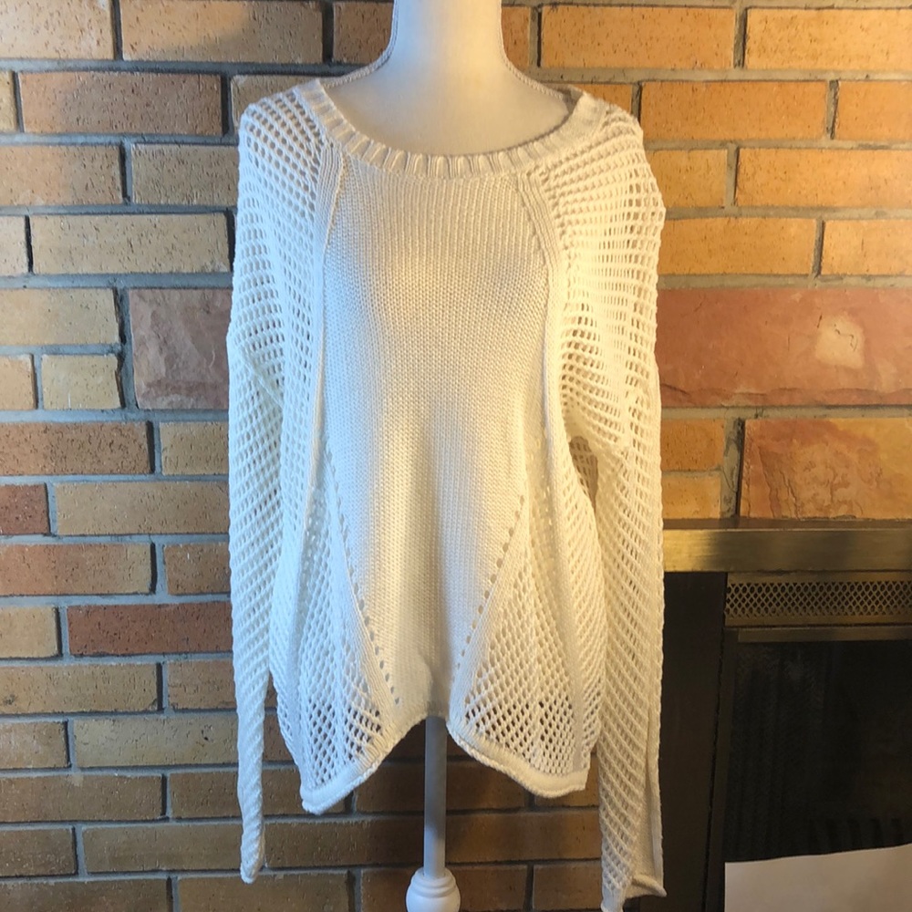 Shark bite sides open knit sweater